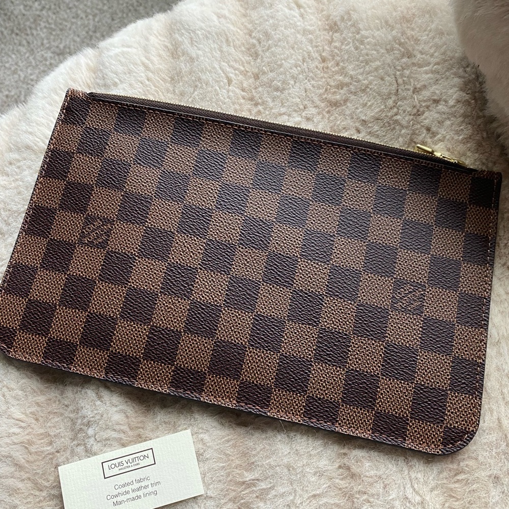 EUC Louis Vuitton Neverfull wristlet. - Picture 1 of 2